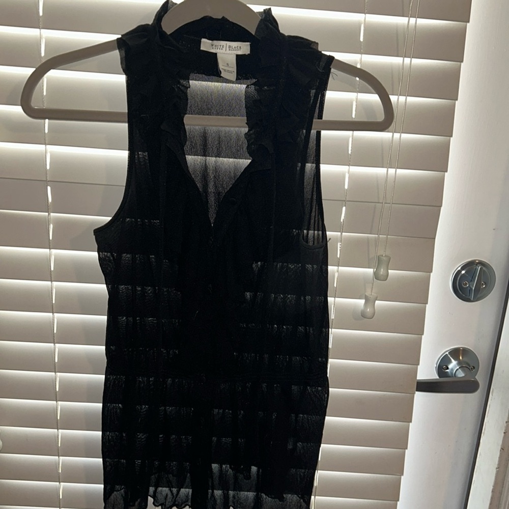 Black dressy sleeveless blouse from White House Black Market, size S.